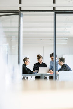 Young business people having a meeting in office
