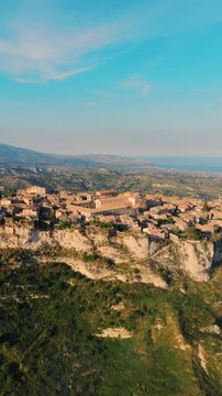 Approach the ancient rural village of Gerace with its churches and Italian house