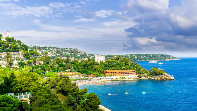 beautiful seascape of resort landscape on amazing sea coast with white baots green coasts and brisht sunset or sunrise cloudy sky of the colorful vacation summer landscape