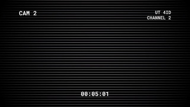 A surveillance camera view displaying a timestamp and channel information on a dark striped screen. 