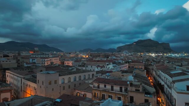 Palermo City At Night With Mount Pellegrino In The Distance In Italy. - aerial drone shot