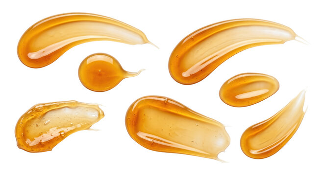 Clear amber honey cosmetic gel smears with bubbles, isolated on transparent background