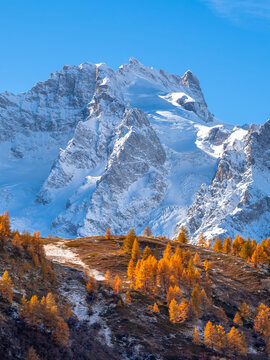 La Meije, surrounding peaks and glacier du Lautaret in Ecrins National Park, French Alps. Snow-covered mountains in the Hautes-Alpes, France