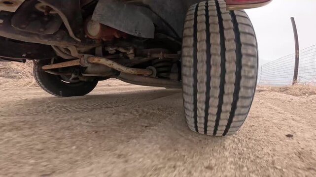 Close-up tire tread fills the frame