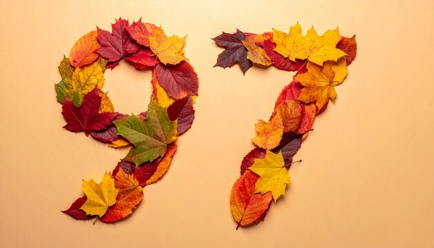 The number 97 is creatively formed using colorful autumn leaves on a surface.