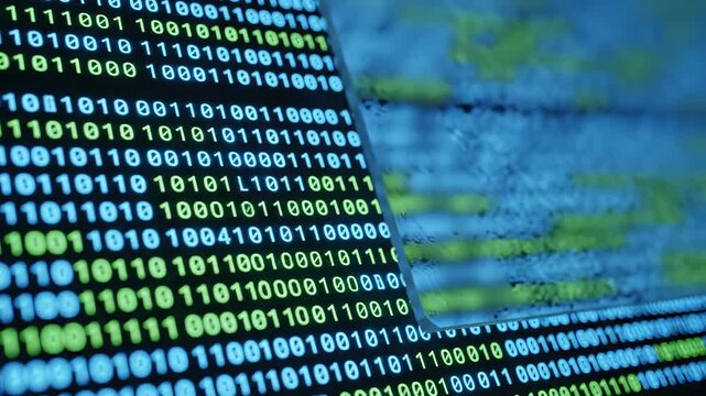 Closeup of digital binary code on screen