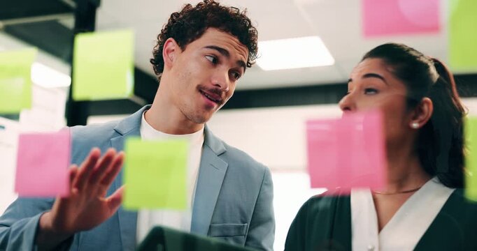 Glass wall, sticky notes or team in office with tablet, problem solving or growth strategy for campaign. Ideas, people or marketing staff with tech, brainstorming or launch plan for brand development