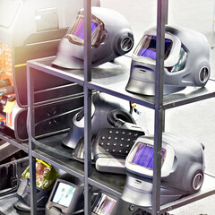 Auto Darkening Welding Helmets Displayed on Workshop Shelf
