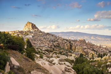 Naklejka premium Beautiful panoramic view of Uchisar Castle and volcanic rock valleys in Cappadocia, Turkey.