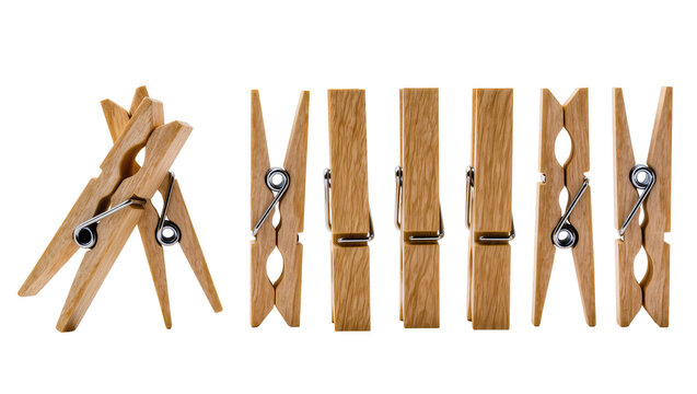 Wooden clothespins with metal springs arranged in a row