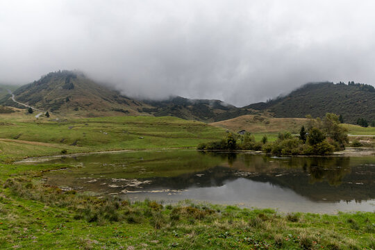 Lac de Joux Plane under a cloudy sky in the French Alps, Haute-Savoie