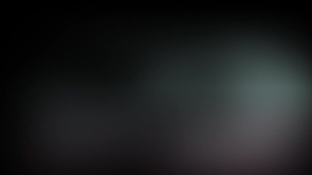 Animation abstract soft gradient light leaks loop motion background on black background. Blurry abstract background with colorful lights.