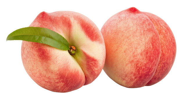 Two ripe peaches with green leaf and stem