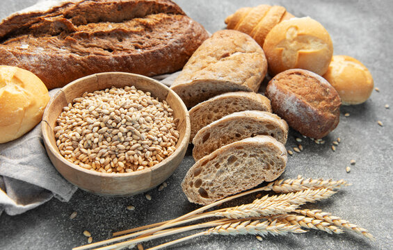 Assorted fresh oven baked bread products with wheat