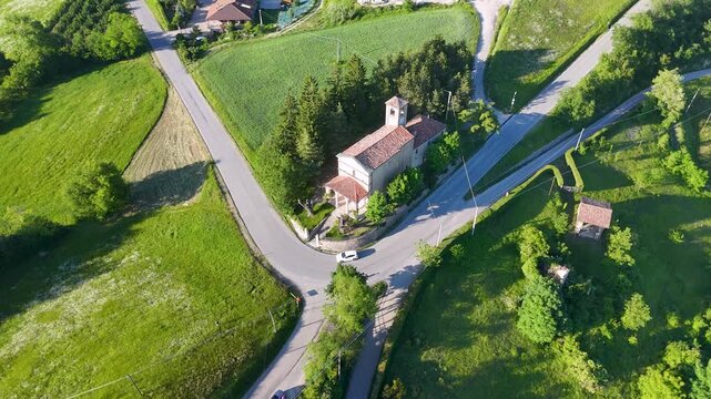 Aerial View of a Rural Church and Road in Piedmont Italy