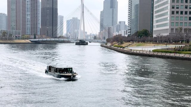 Modern Water Taxi Navigating the Sumida River in Tokyo Japan