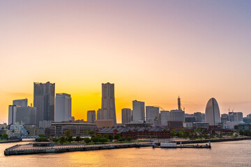 sweet gold sunset winter and light illumination from Cityscape of Yokohama city, Skyline and office...