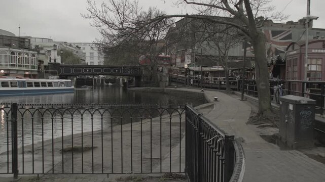 Scenic London Lake with Small Ferry and Bridge