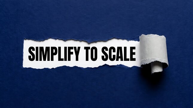 Simplify to scale business concept, torn paper revealing text on dark blue background, idea of growth and efficiency.