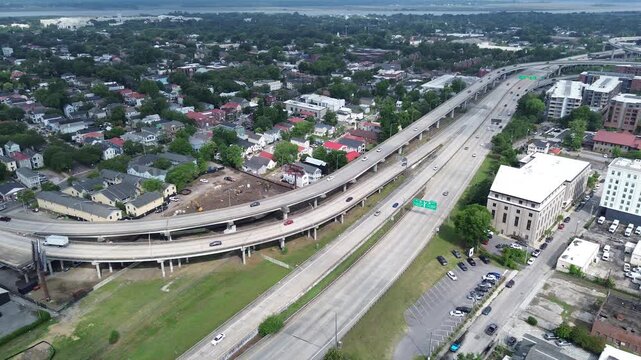 NoMo construction corridor on Meeting St near Morrison Dr shows active construction zones, railadjacent parcels, dense residential blocks stretching toward Cooper River in Charleston, SC