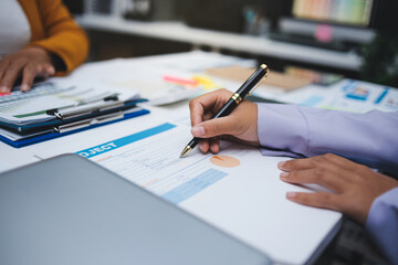 Fototapeta premium Auditor and accountant team working in office, analyze financial data and accounting record with calculator. Accounting company provide finance and taxation planning for profitable cash flow. Insight