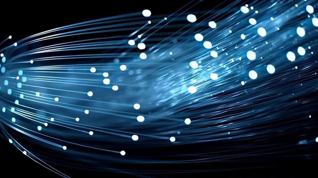 Bright blue fiber optic strands transmitting data as a glowing light stream, representing digital communication, high speed internet technology, and information flow on a dark background