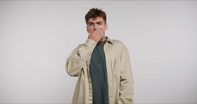 Man shows different gestures in four frames with simple expressions at an indoor location during daylight hours