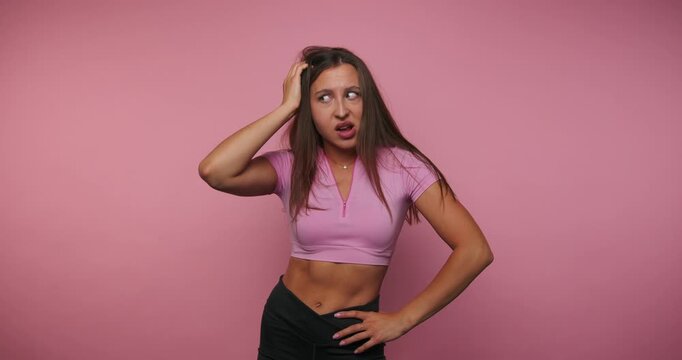 Woman shows different expressions of confusion and realization in four playful frames with a pink background in a studio setting