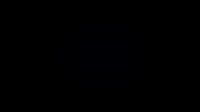 Slow zoom of retro crt monitor grid pattern flickering and shifting with scan lines on dark studio screen in vintage analog display