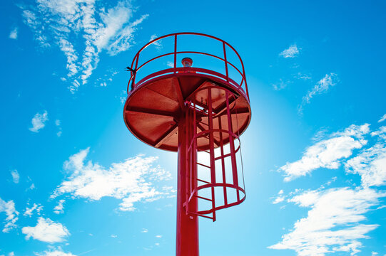 Light beacon at a blue sky background