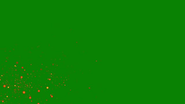 Abstract fire sparks flying motion with glowing embers, burning coals, smoke particles and fiery ash isolated on green screen background cinematic overlay seamless video in 4k