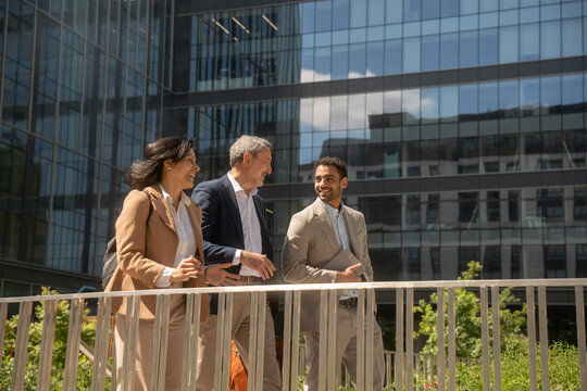 business corporate coworkers people of different ages in the city outside the office