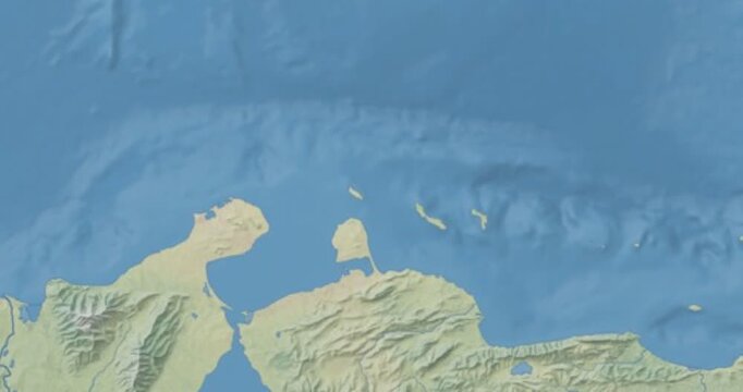 Aruba on Globe. Zoom into the country with Earth spinning on dark background. Physical world map with Aruba and label on it. Country view animation.