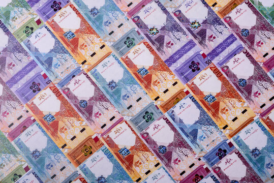 Qatar paper money, the Qatari riyal as a tool for financial transactions and trade. Qatari money