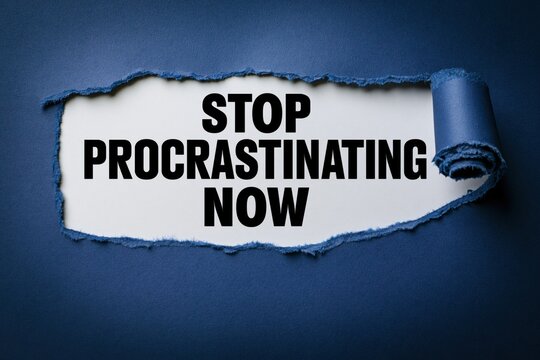 Stop procrastinating now message written under torn blue paper background