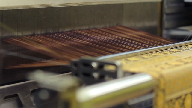 Weaving Machine Producing Ornate Patterned Fabric in Textile Factory