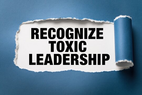 Recognize toxic leadership HR warning revealed under ripped dark blue paper