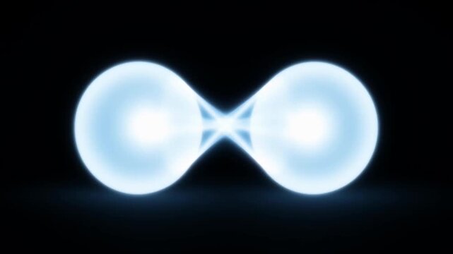 Abstract animation of two glowing blue cells merging and separating on black background.