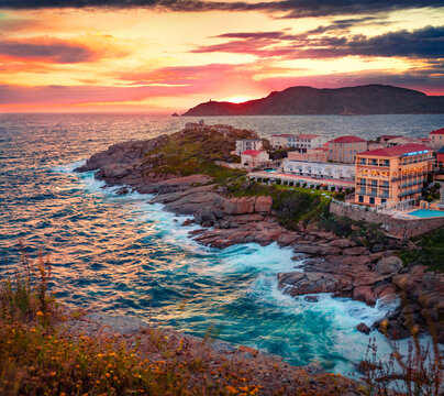 Unbelievable evening scene of Calvi port. Stuning summer sunset of Corsica island, France, Europe. Incredible seascape of Mediterranean sea. Traveling concept background.