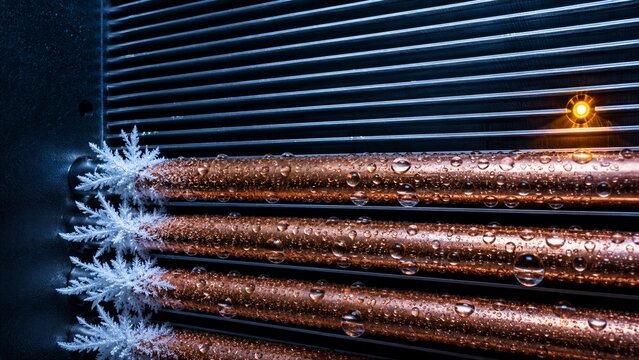 Frost Crystals on Copper Cooling Pipes Close-Up for Technology Background