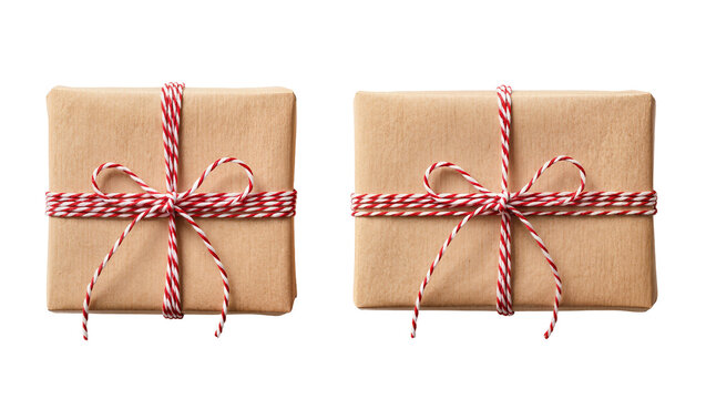 Two brown paper gift boxes tied with red and white twine bows