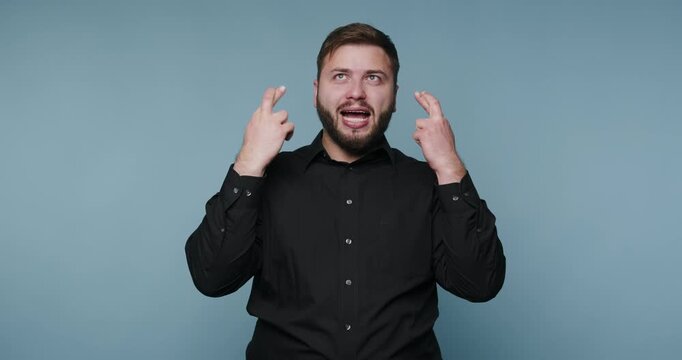 Man shows different expressions and signs in simple actions in a studio setting during daylight hours