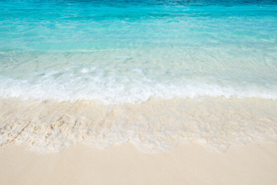 Different shades of blue and turquoise on a beautiful beach in the Maldives