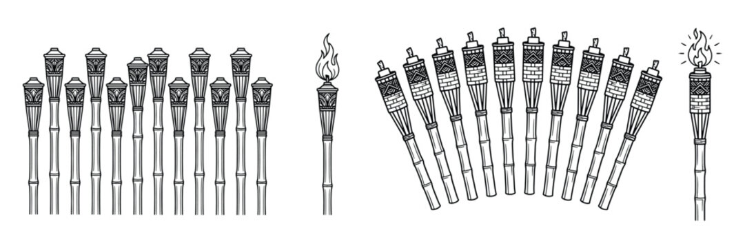 Collection of bamboo tiki torches standing upright and arranged in fan patterns decorative lighting equipment for garden parties summer evening events.