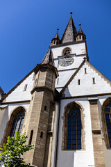Obraz premium Vertical Low Angle of Majestic Gothic Church Cathedral Tower