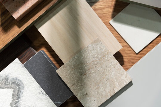 Interior Design Material Mood Board with Natural Wood, Stone, and Marble Samples