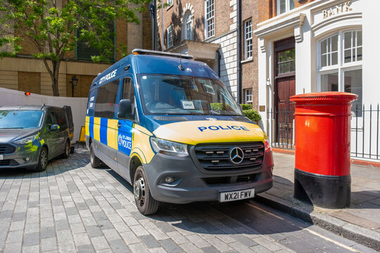 City Police van, street support group vehicle law enforcement security patrol, typical urban scene Devonshire Square, Public safety England UK landmark, Urban policing London, United Kingdom