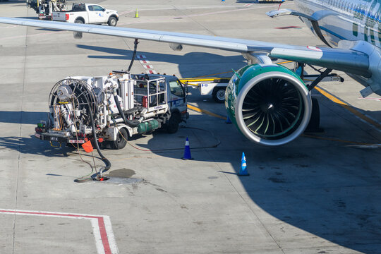New York, USA - February 24th 2025 - Airplane being serviced at the tarmac of JFK airport in New York