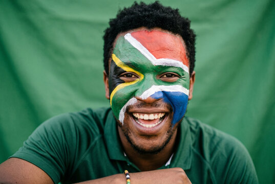 South African Fan Celebrating with Face Paint