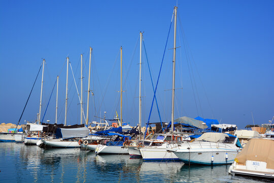 JAFFA ISRAEL: Fishing boats over Mediterranean sea at old Jaffo marina. the ancient port, historical city of the Middle East